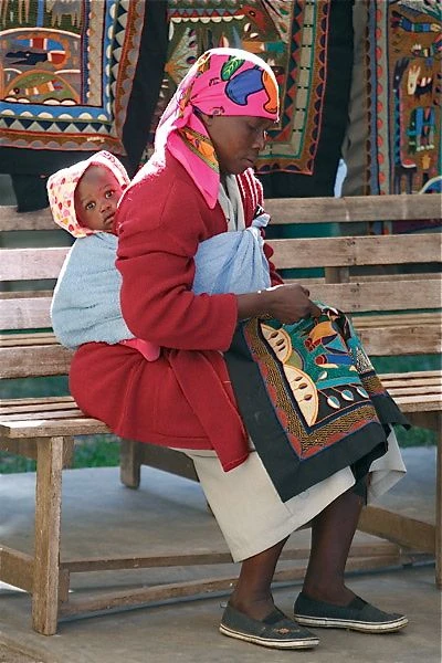 kaross-maker-with-baby-on-back.jpg