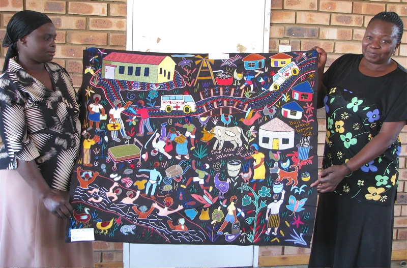 Bertha and Pinky with Mapula Embroidery.