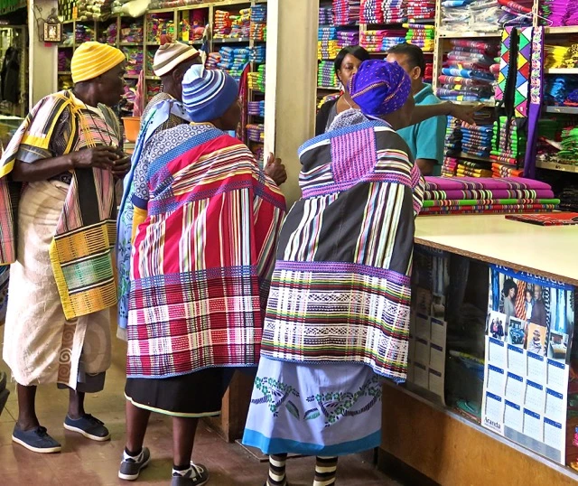 Shangaan women shopping for fabric.